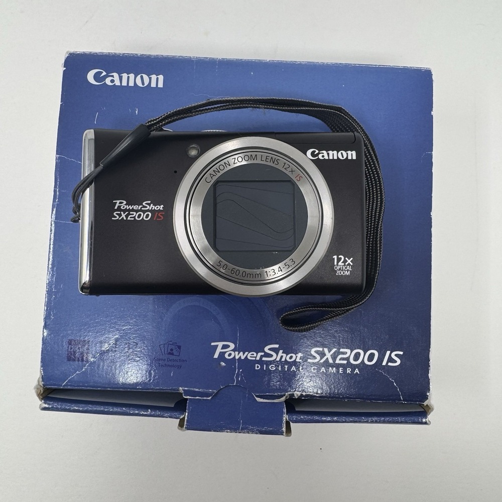 Canon PowerShot SX200 IS  12.1MP w/Charger And 2 Batteries 16GB Cable And Manual